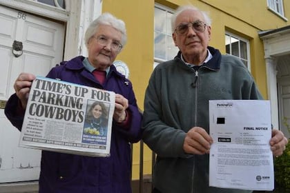 Pensioners threatened with court over parking ticket typing error