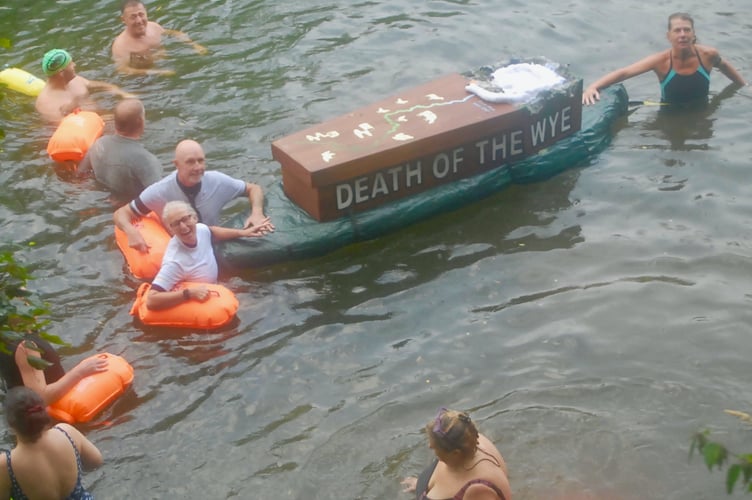 Anti pollution swimmers in the River Wye