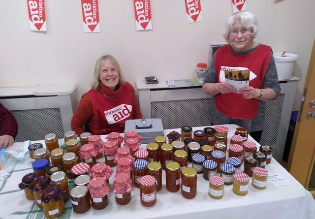 Liz Williams and Mary Lewis with some of the jars of homemade marmalade.