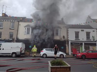 40 fire crews tackled blaze which gutted shop