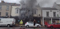 40 fire crews tackled blaze which gutted shop