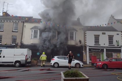 40 fire crews tackled blaze which gutted shop