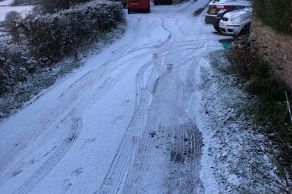 Warning on snow-hit roads