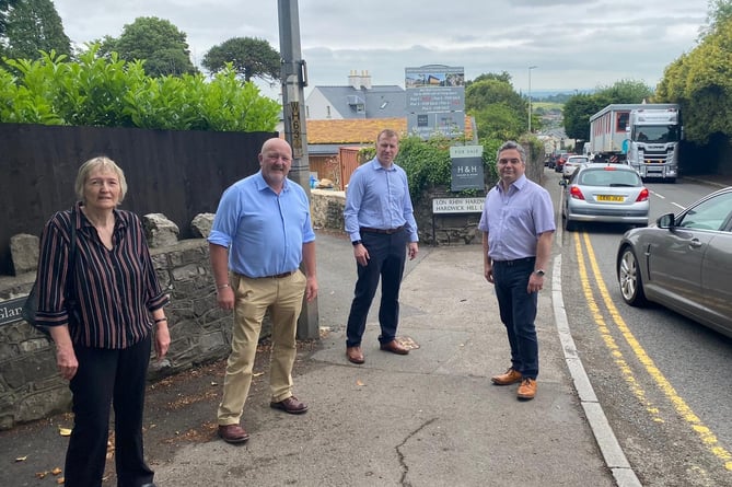 Monmouth Senedd Member Peter Fox, second from left, with Conservative councillors Louise Brown, Paul Pavia and Christopher Edwards: Photo: Local Democracy.