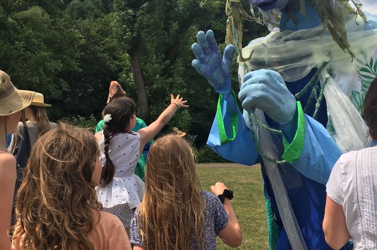 Children greet the Goddess of the Wye at Redbrook