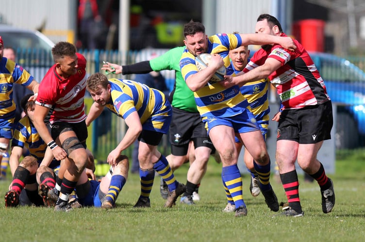 Dean Bartlett evades a Dowlais tackler