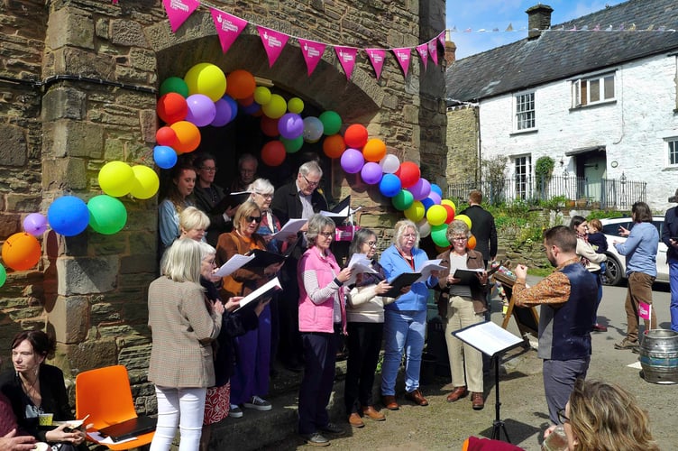 The Kitchen Singers provide some musical entertainment