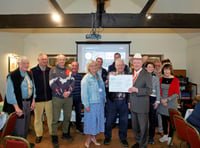 Gathering of the Green enthusiasts donate to Welsh charity