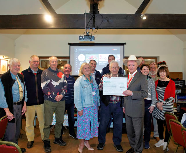 Gathering of the Green enthusiasts donate to Welsh charity