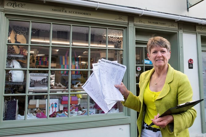 Yvonne Perry with her petition to bring back herringbone parking