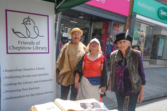 John and Nina Snook and Mary Clinch of the Friends of Chepstow Library offered the chance to try writing with a quill. 