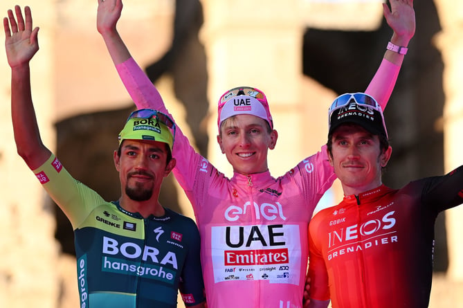 Geraint Thomas, right, soaks up the applause on the podium.