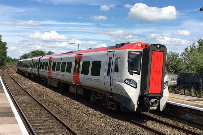 A Transport for Wales Class 197 train arrives at Lydney with a service for Maesteg.