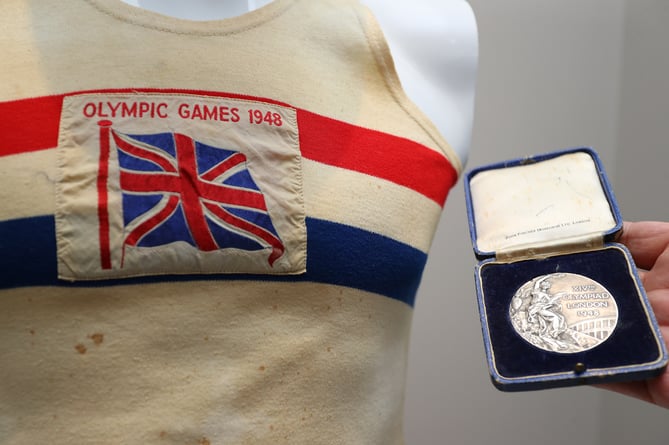 Bill Griffiths' Olympic silver medal and Ken Jones' running vest are part of a Welsh Sports Hall of Fame Olympic exhibition