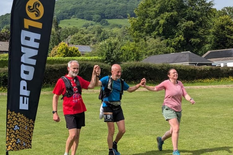 Keith Penny crosses the line after 100 miles