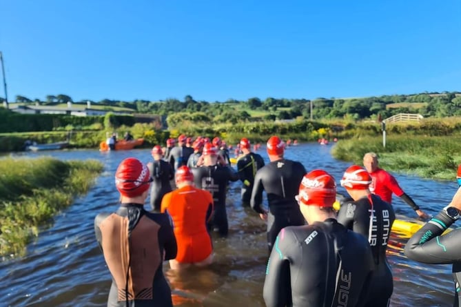 Swimmers in the Devon estuary taking part in the Swoosh event. (Pictures: Tabitha Allsop)
