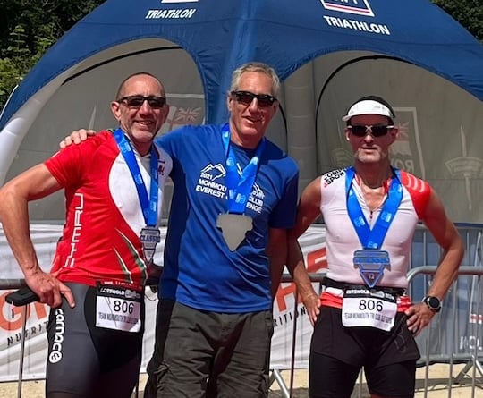 Triathlon relay winners Tim Morris, Phil Tilley and Matt Unsworth