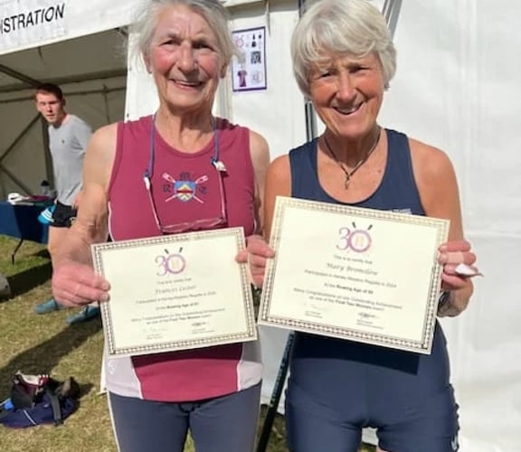 Frances Lester, left, with her certificate at Henley Masters Regatta