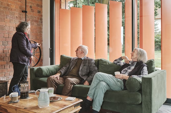 Plas Hendy Stable Block - clients in the living room with the new pivoting louvre mechanism (Picture Francesco Montaguti)