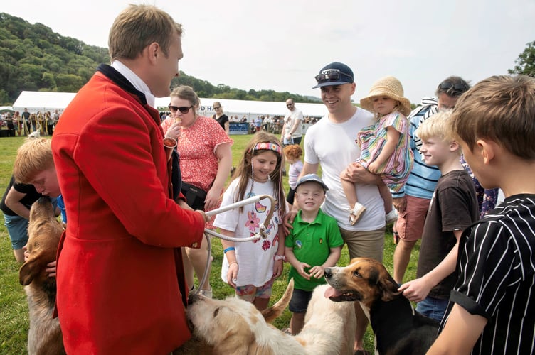 Kyle Price and family enjoy the traditional 'meet the hounds' in the main ring