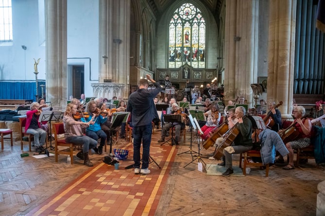 Thomas Payne conducts the Royal Forest of Dean Orchestra.