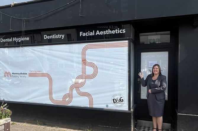 Branch Manager Nicky Simmons outside the new premises on Monnow Street