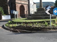 Concerns for medieval cross on busy roundabout