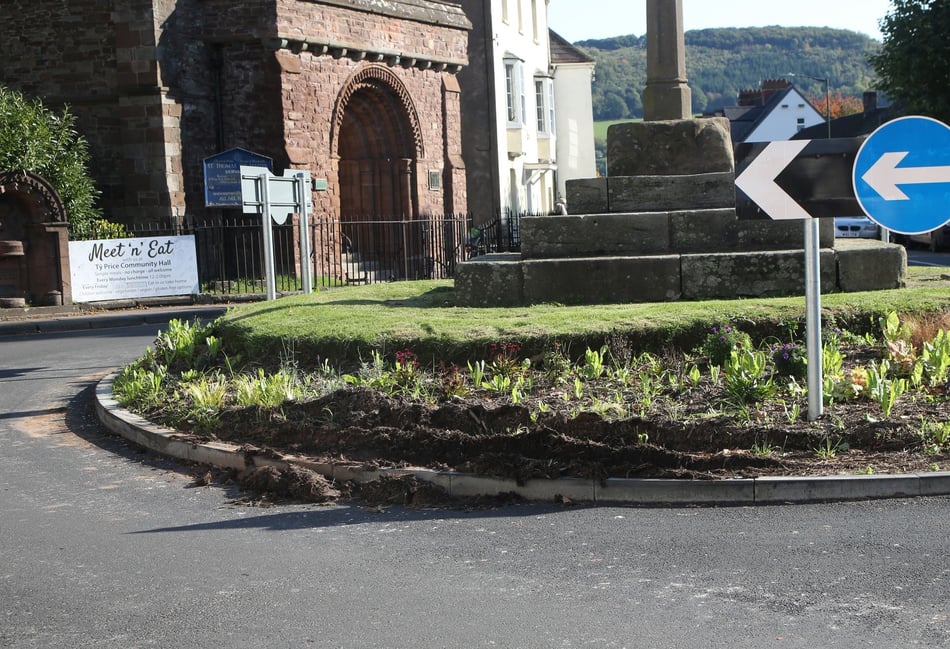 Concerns for medieval cross on busy roundabout