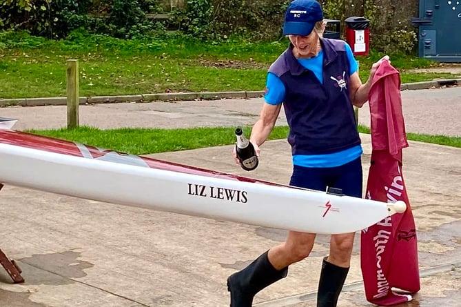 Liz Lewis christens the boat named after her