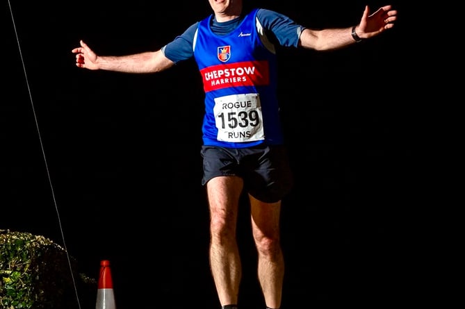 Chepstow's Stephen Dilly crosses the line