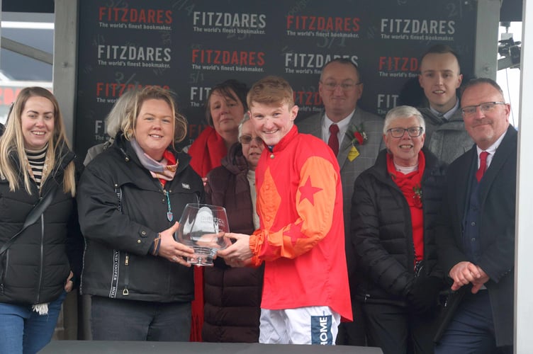 Shirenewton Trainer Grace Harris celebrates The Midwife's win with jockey Joe Anderson and connections