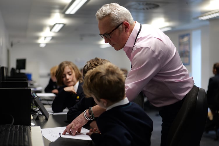 Escape The Country presenter, Jules Hudson with Haberdashers Monmouth School pupils.